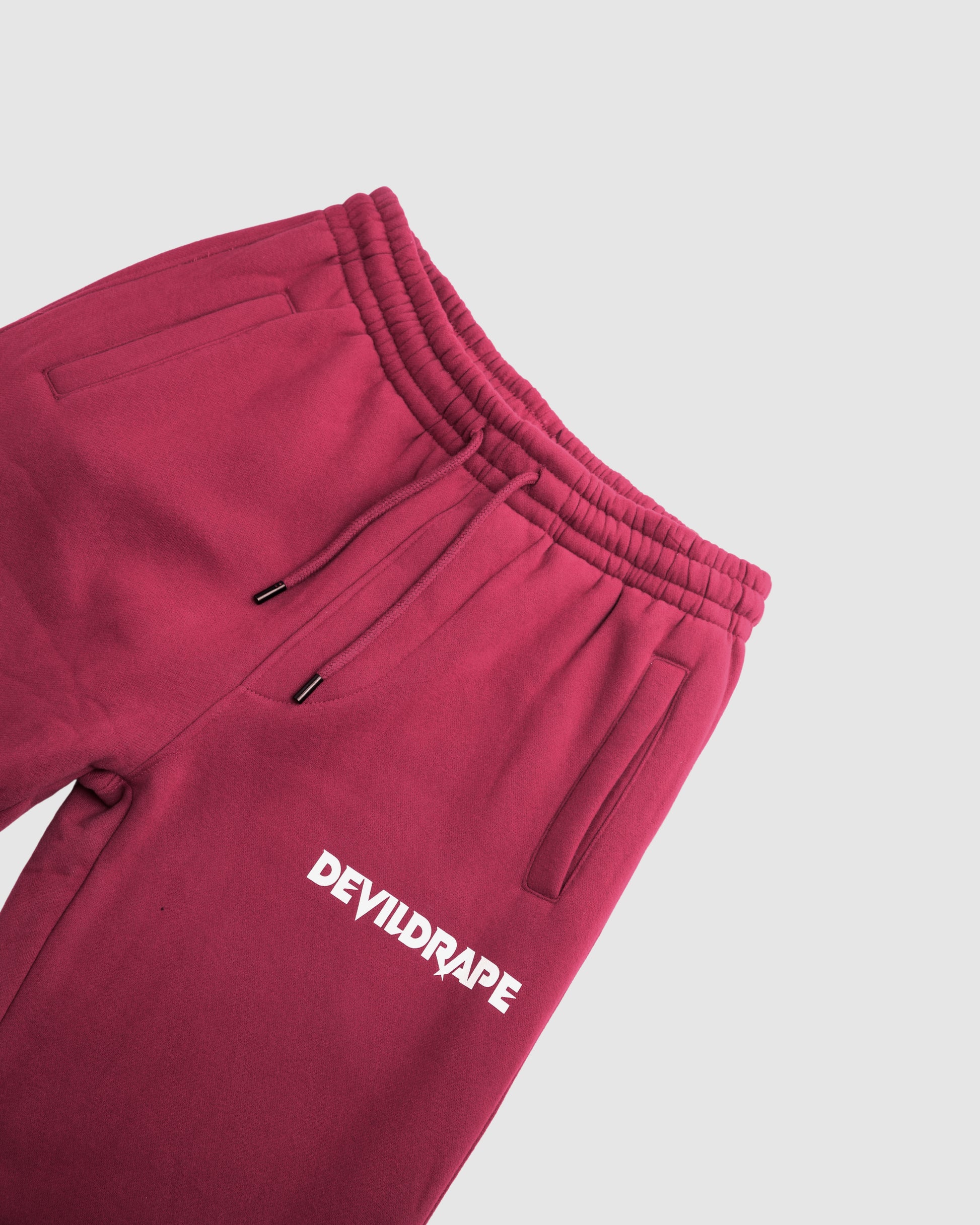 DEVILDRAPE UNISEX RED SWEATPANTS ESSENTIAL